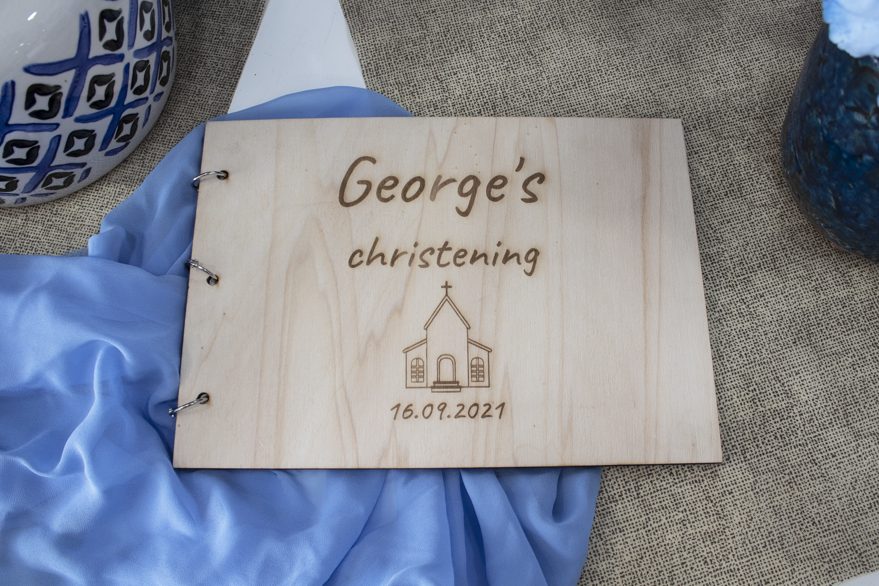 "Custom Wooden Christening Wish Book" - Image of a beautifully crafted wooden christening book with engraved details and ample space for personalization, a timeless and elegant keepsake for your child's special occasion.