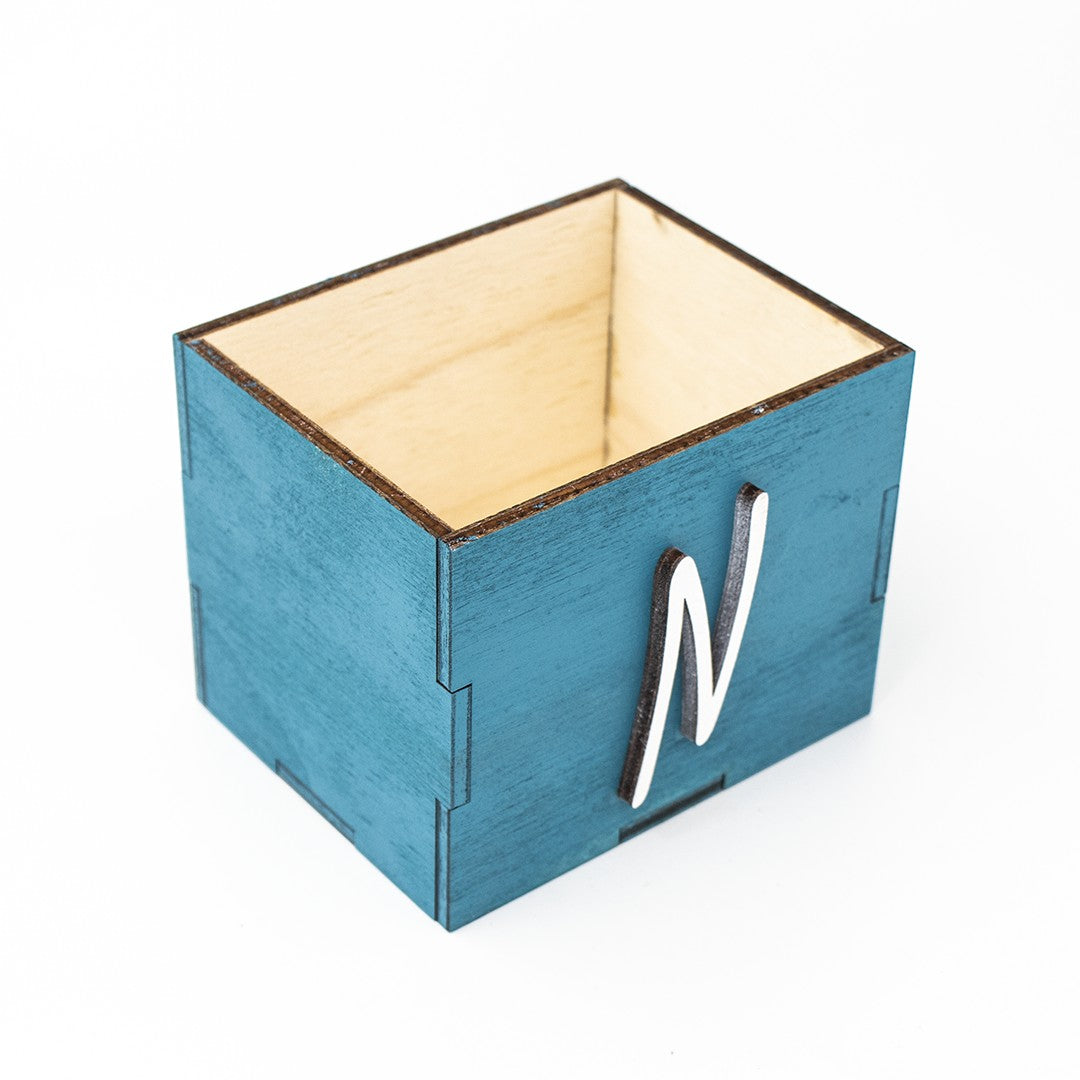 Wooderland personalized wooden keepsake memory box, close-up of engraved initial