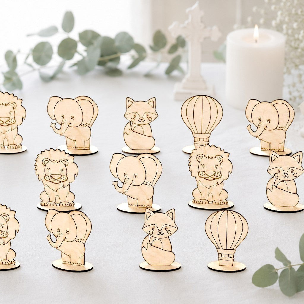 Wooderland custom laser-cut wooden animal and hot air balloon figures on circular bases for party favors