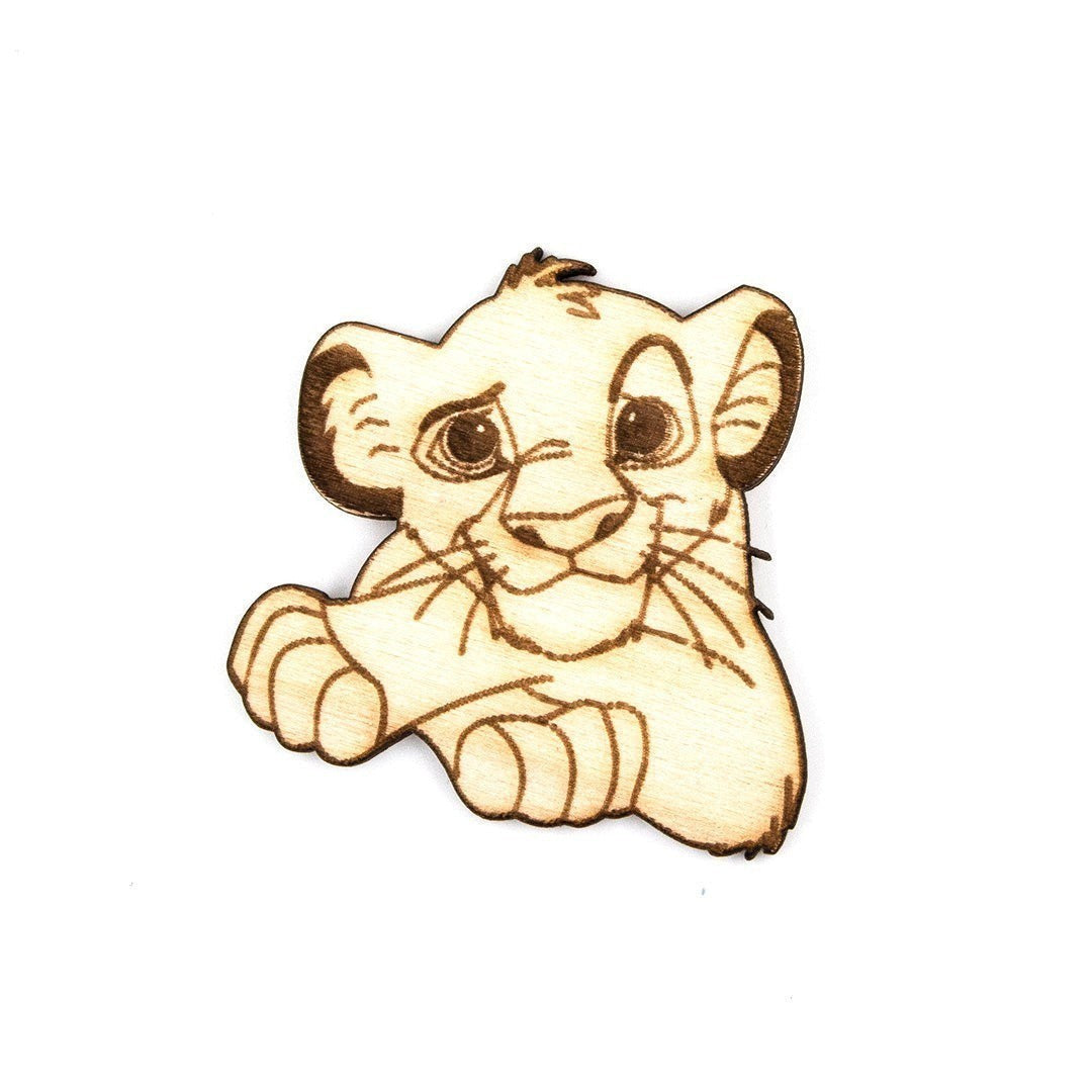 Wooderland custom laser-cut plywood lion cub figure with detailed engraved features for party favors or decor
