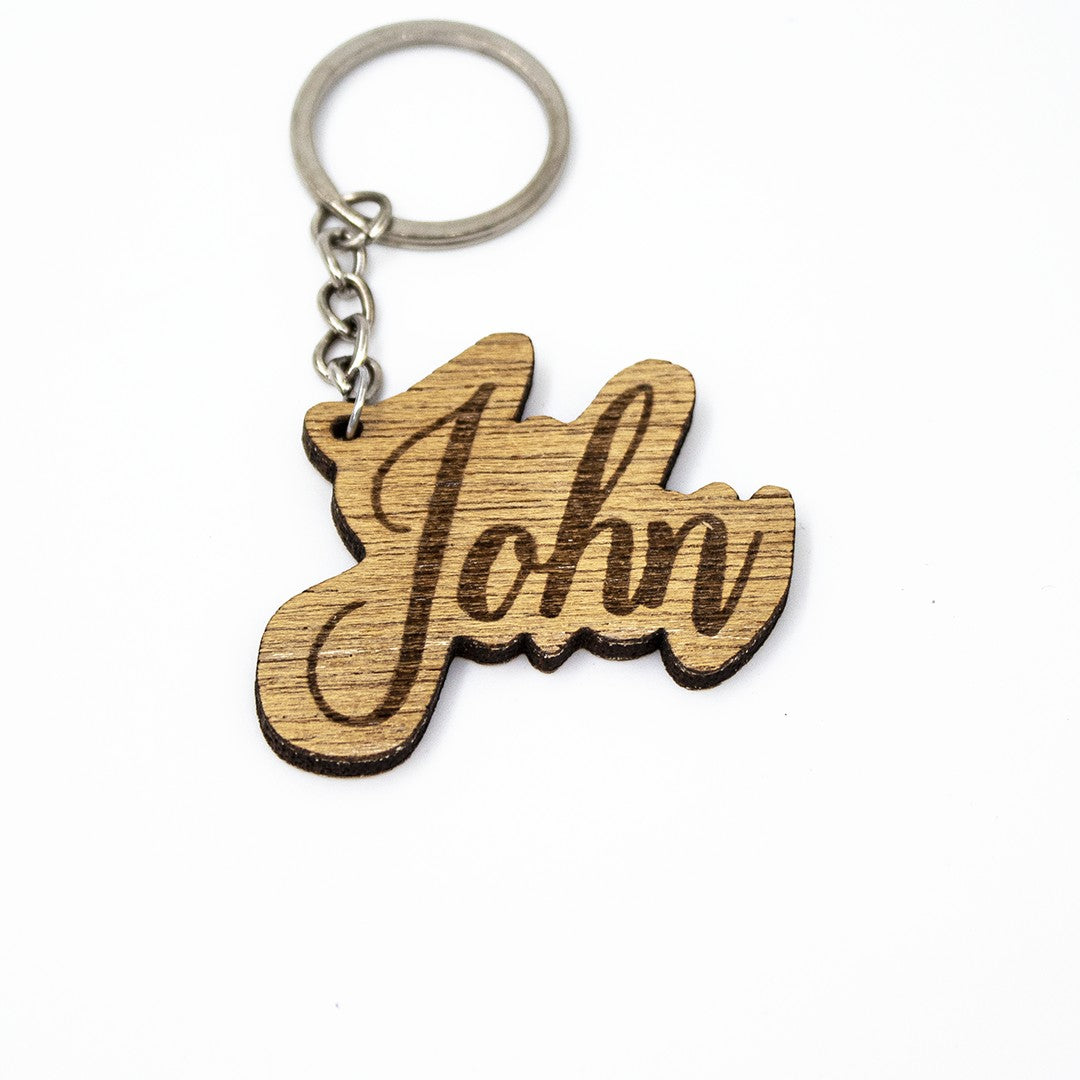 Wooderland custom engraved wooden name keyring with cursive John lettering and silver metal ring