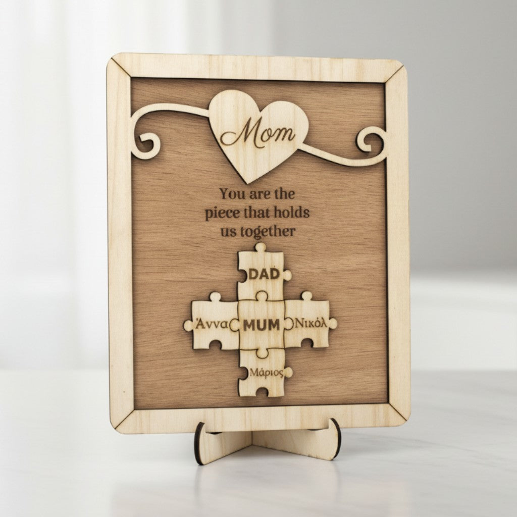 Wooderland custom wooden puzzle plaque for Mom featuring a heart design and personalized family name puzzle pieces.
