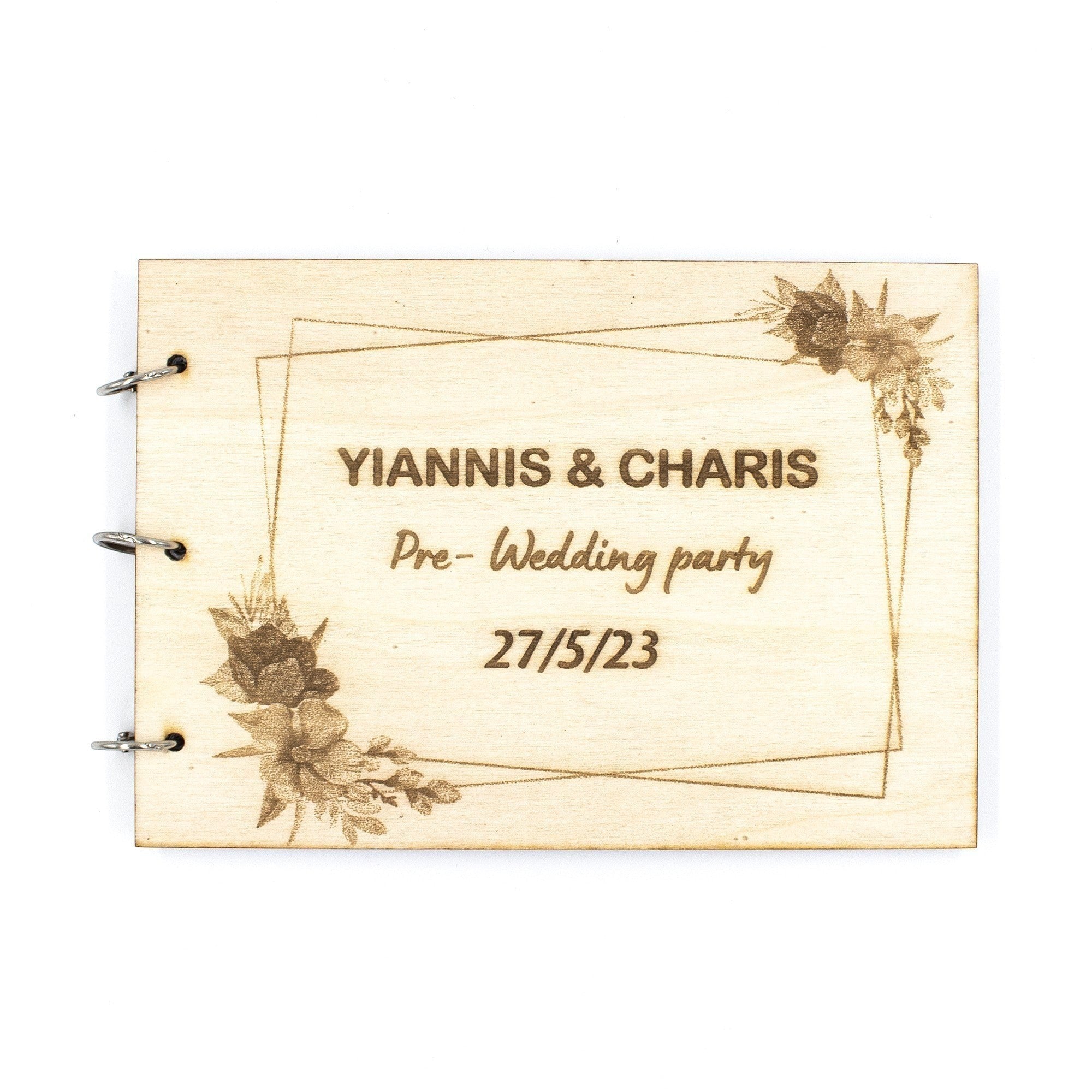 Wooderland A5 wooden wish book with custom laser-engraved floral frame and wedding party text on light wood cover.