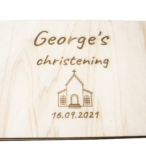 Wooderland personalized wooden christening wish book with engraved church design, name, and date on light wood cover.