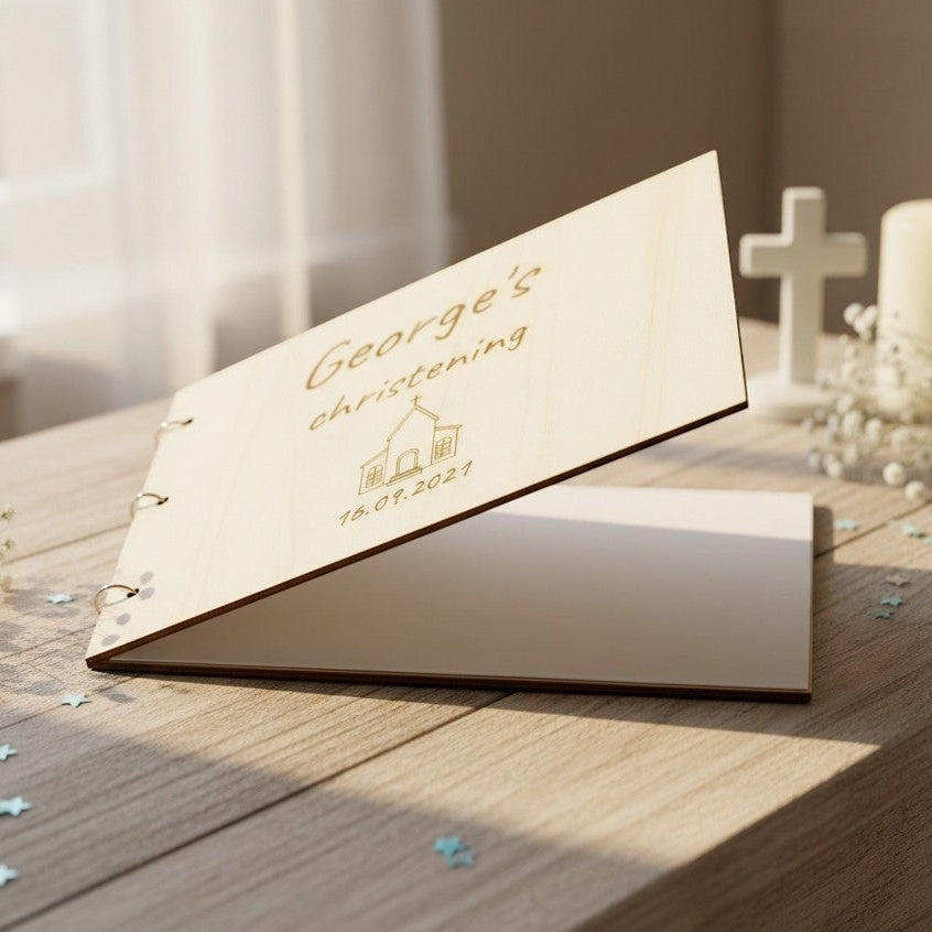 Wooderland personalized wooden christening wish book with engraved church design on a wooden table