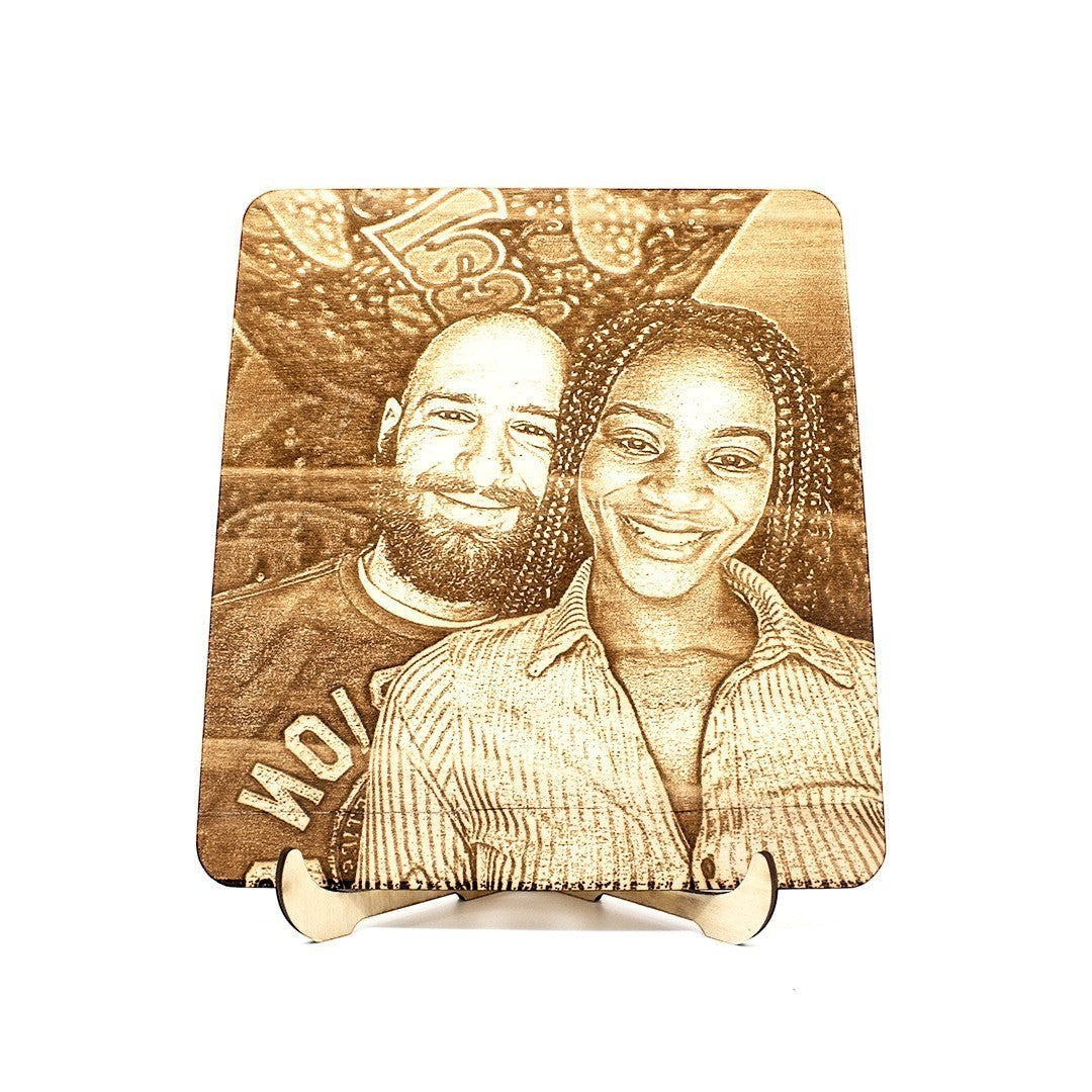 Wooderland personalized wooden portrait featuring a laser-engraved couple photo on a free-standing varnished wood base.