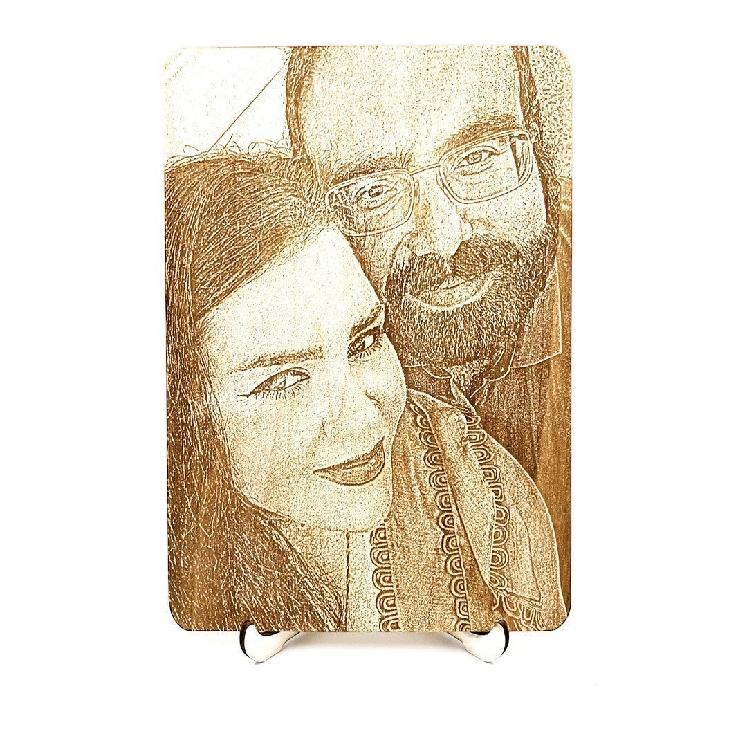 Wooderland personalized wooden portrait featuring a laser-engraved couple photo on a free-standing varnished wood base.