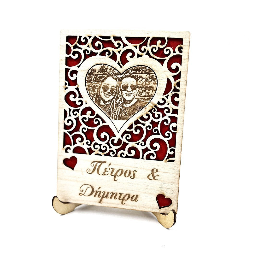 Wooderland custom engraved wooden photo portrait with heart frame, red accents, and personalized text on a stand.