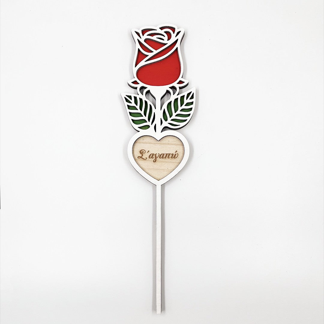 Wooderland engraved wooden rose with red petals, green leaves, and a heart base featuring the Greek text Σ'αγαπώ.