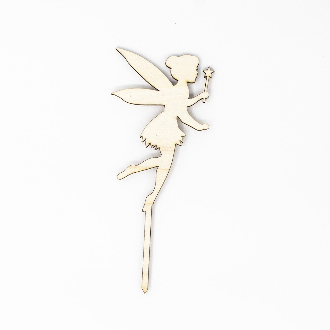 Wooderland fairy cake topper laser-cut from natural plywood for a princess themed birthday party.