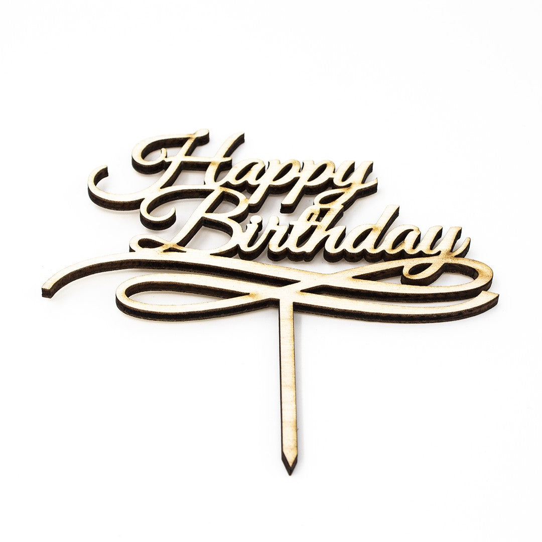 Wooderland laser-cut wooden Happy Birthday cake topper with elegant cursive script font on a white background.
