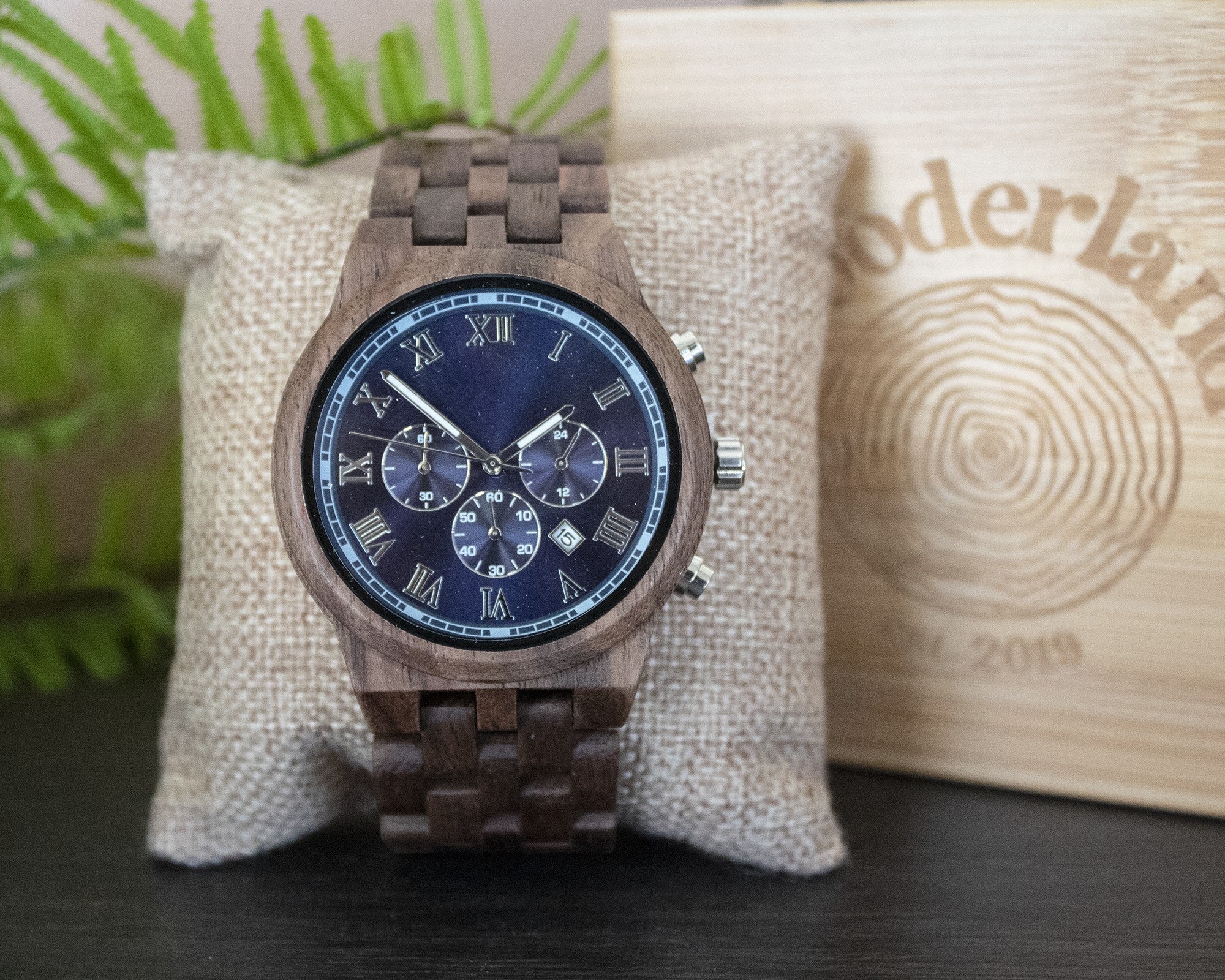 Wooderland Mars wooden watch with a dark blue dial, Roman numerals, and a multifunctional chronograph display.