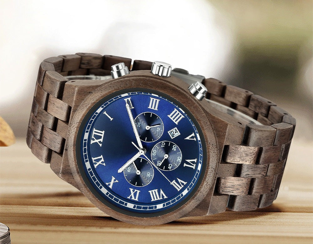 Wooderland Mars wooden watch with a dark wood link strap, blue dial, Roman numerals, and multifunctional sub-dials.