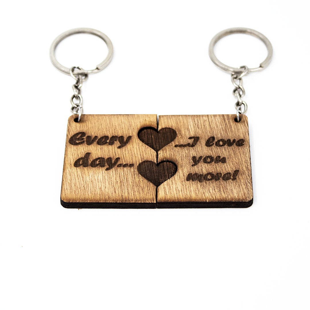Wooderland matching wooden keyrings set with engraved Every day I love you more text and heart cutouts