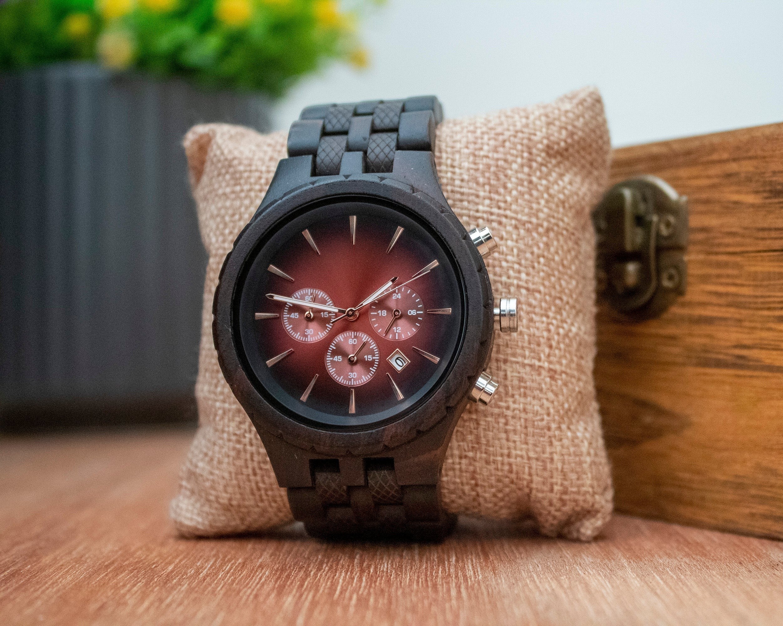 Wooderland Mercury wooden wristwatch with a dark wood band and a deep red gradient dial featuring chronograph sub-dials.