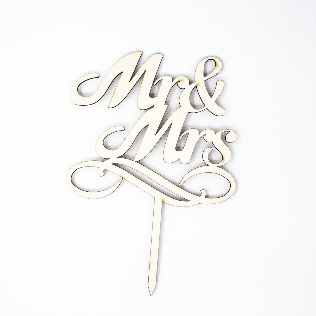 Wooderland Mr & Mrs laser-cut wooden cake topper in elegant script font for weddings