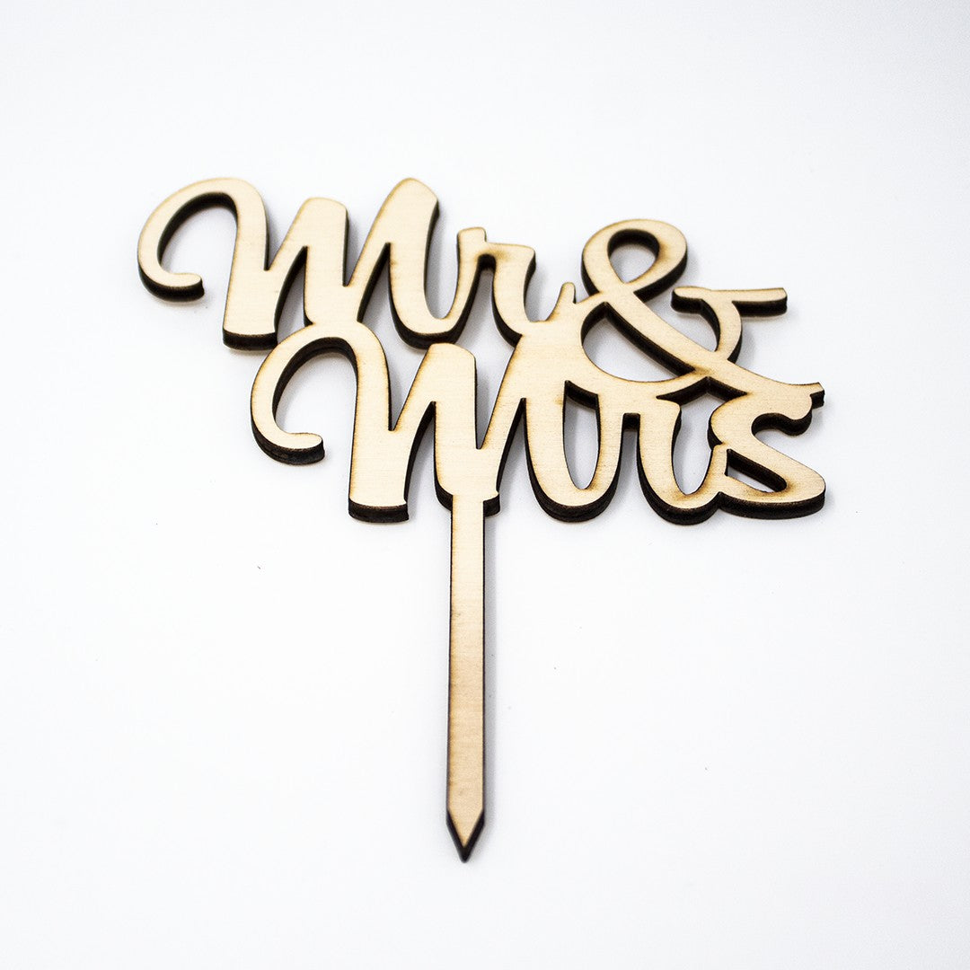 Wooderland Mr & Mrs wooden wedding cake topper with elegant laser-cut script and smooth natural wood finish.
