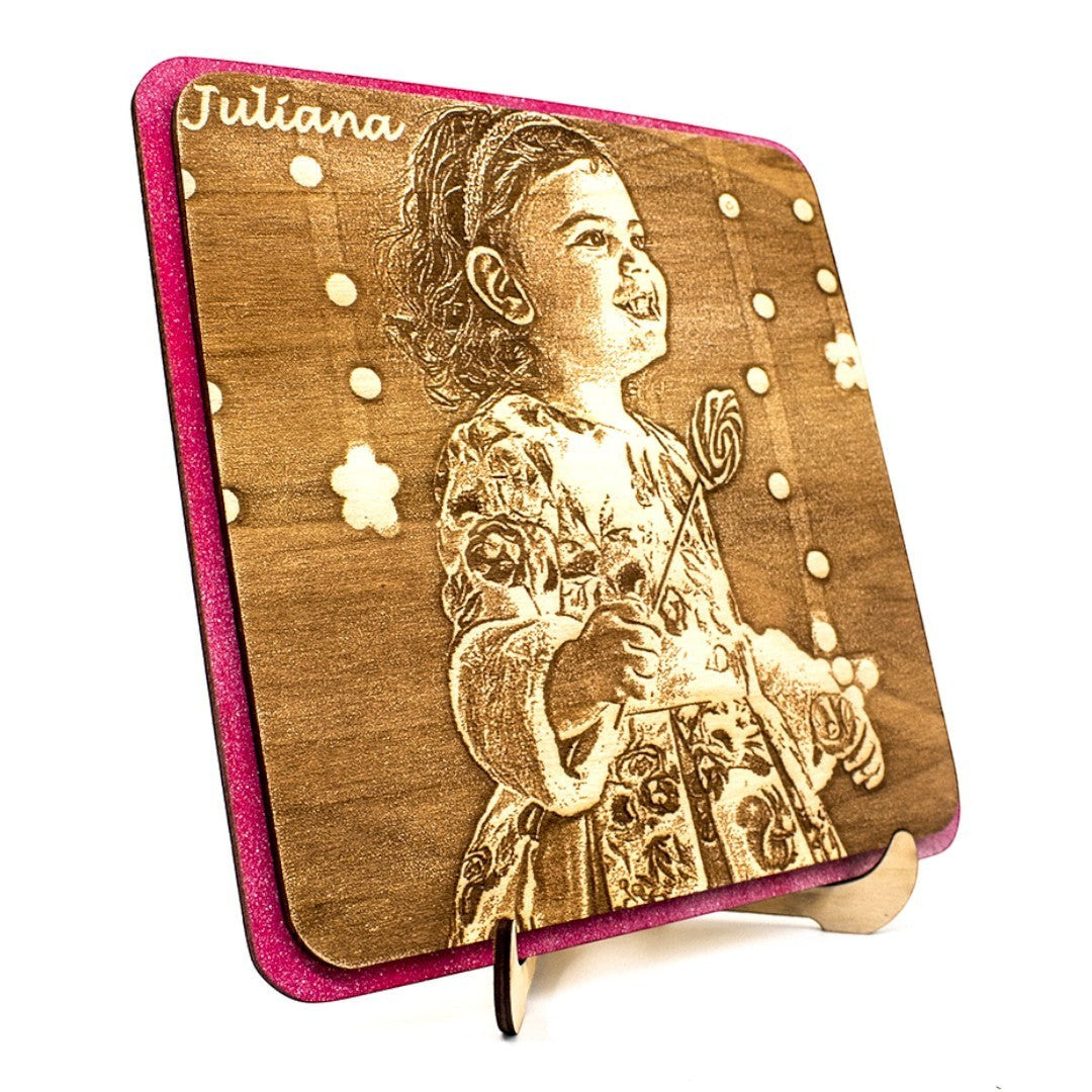 Wooderland personalised wooden portrait with pink glitter border and engraved photo of a girl named Juliana on a stand
