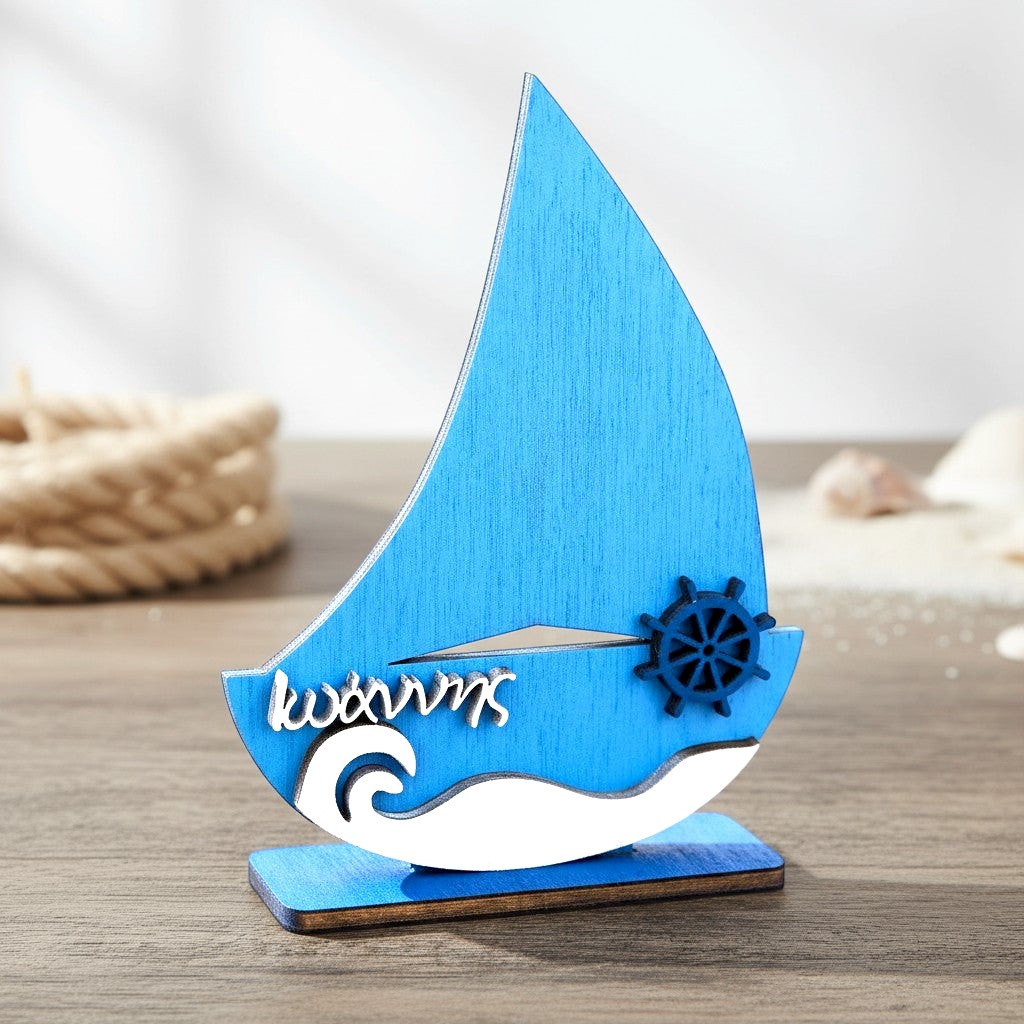 Wooderland handcrafted blue wooden sailboat nursery decor with personalized name and nautical ship wheel detail