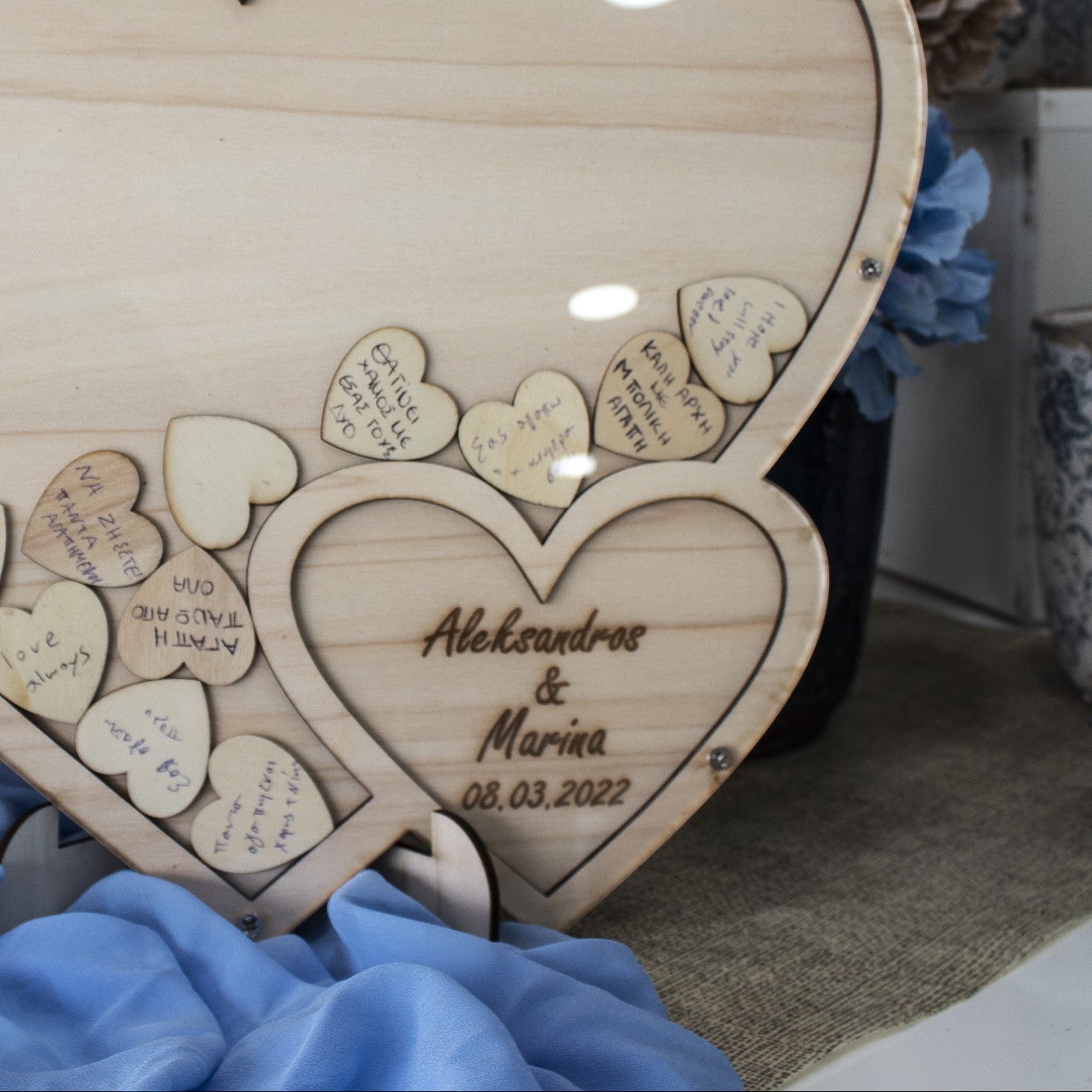 Wooderland custom wooden heart guest book with acrylic cover and personalized engraved names and wedding date.