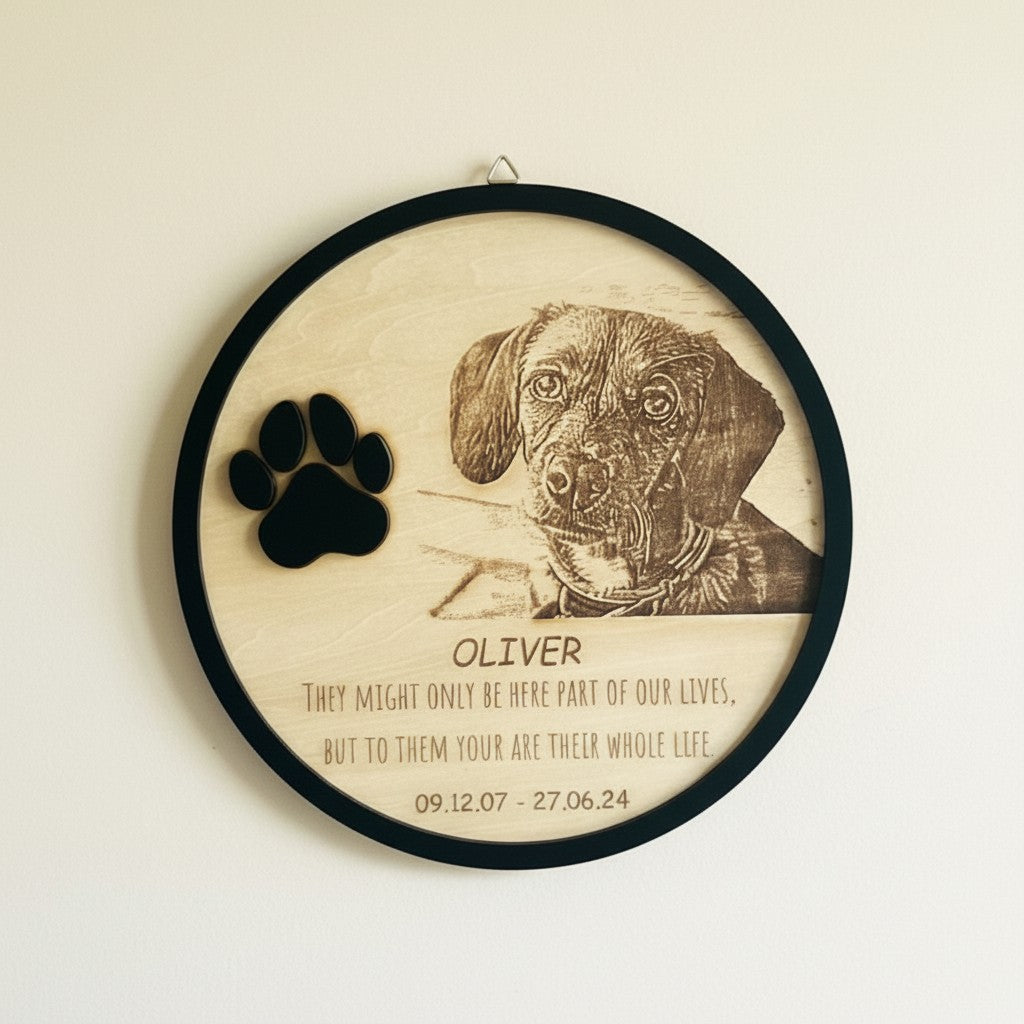 Wooderland circular wooden pet memorial plaque with custom dog photo engraving, paw print, and memorial message.