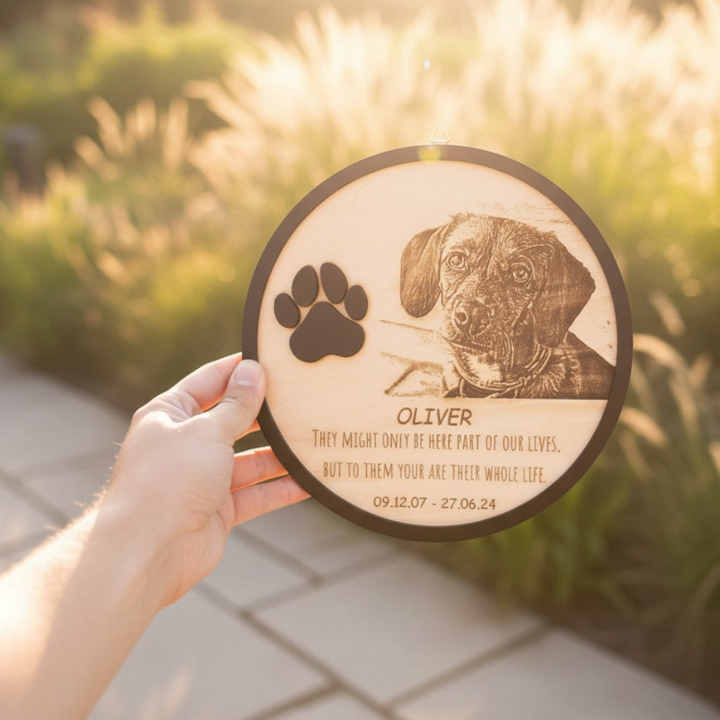 Wooderland personalized circular wooden pet memorial plaque with engraved dog photo, paw print, and memorial quote.
