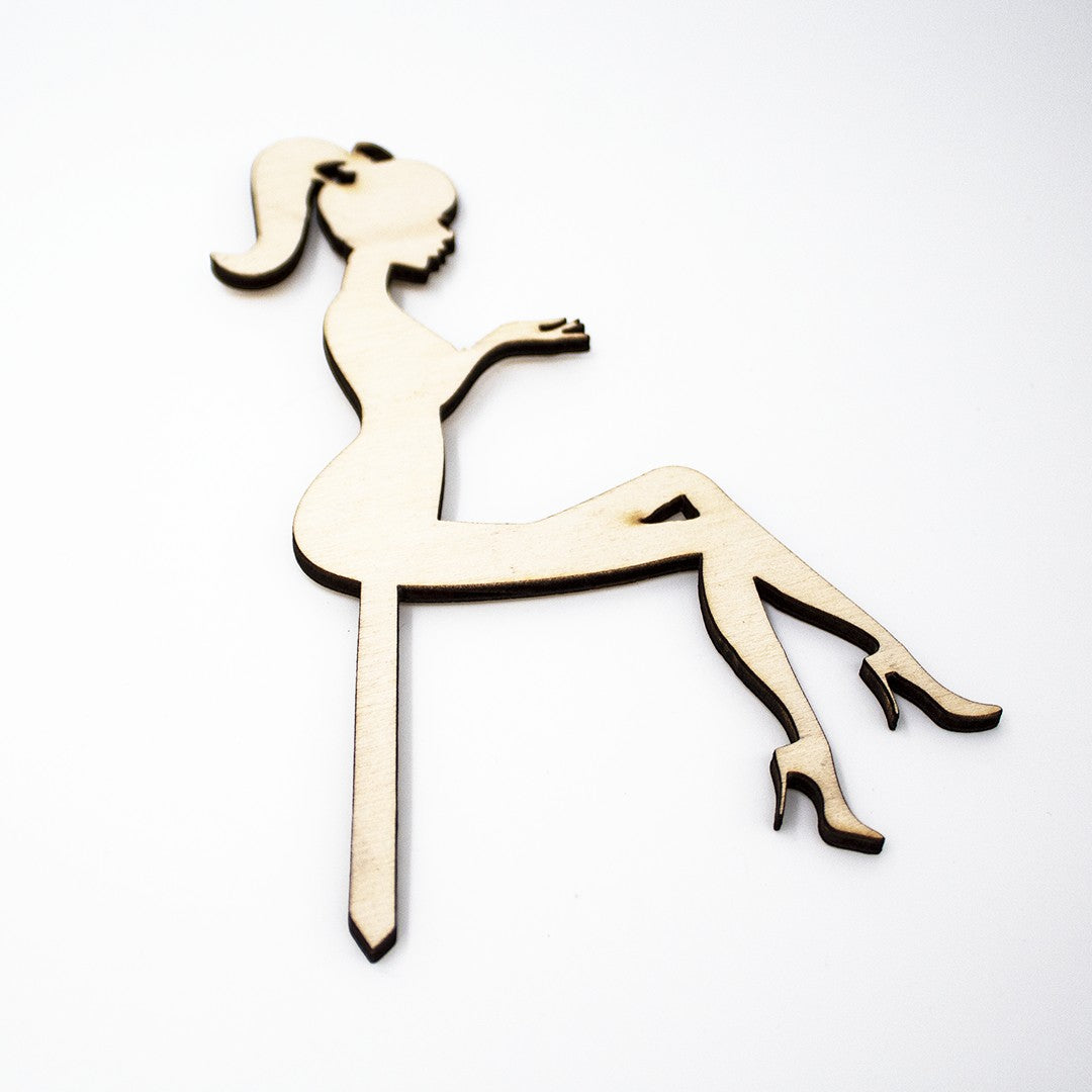 Wooderland laser-cut natural plywood bride silhouette cake topper for weddings or bridal showers.