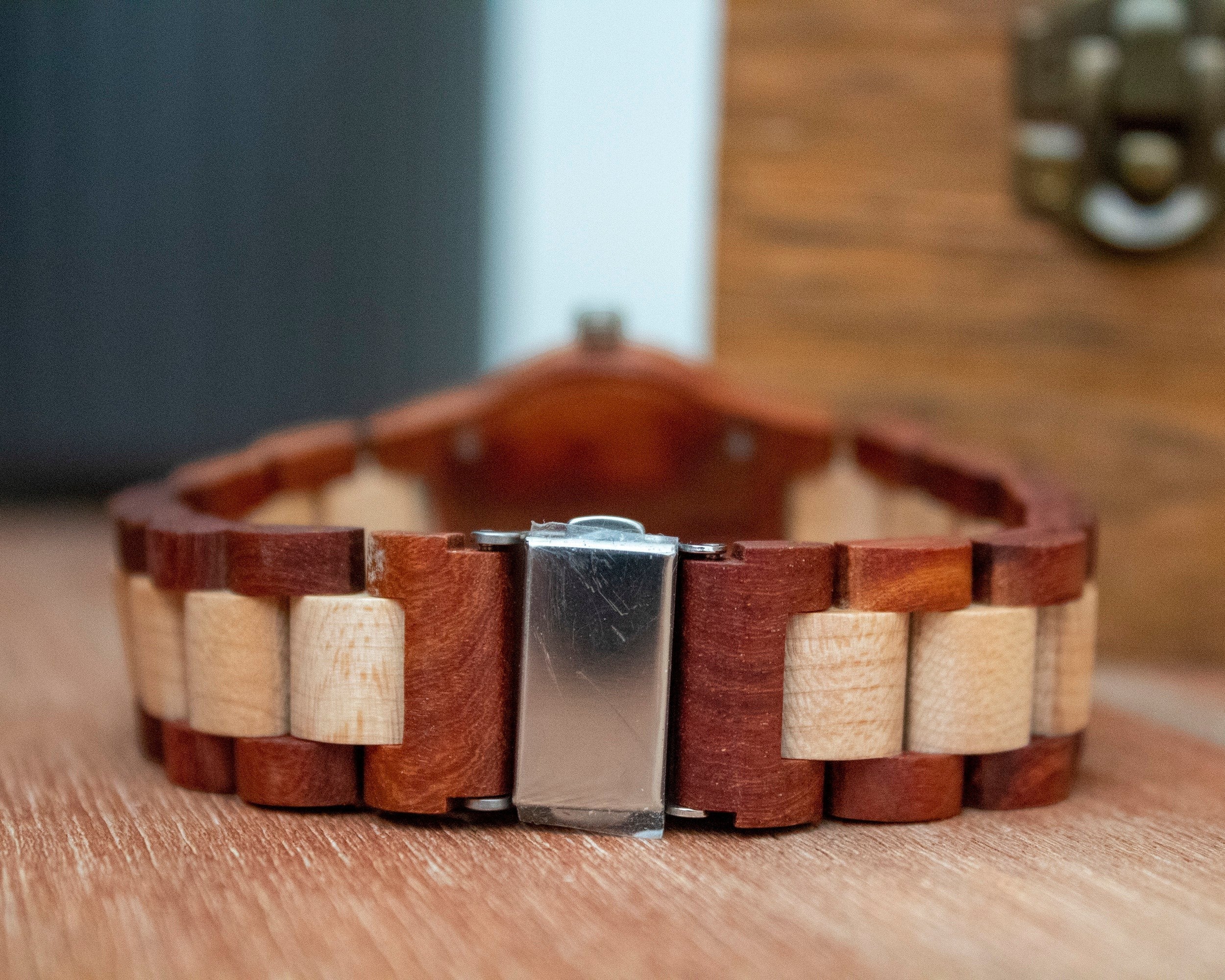 Wooderland Titania watch featuring a two-tone rosewood and light wood link strap with a brushed silver steel buckle.