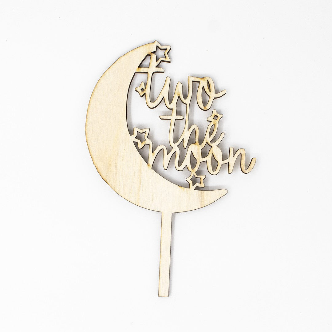 Wooderland wooden Two the Moon cake topper for a 2nd birthday party in natural plywood finish.