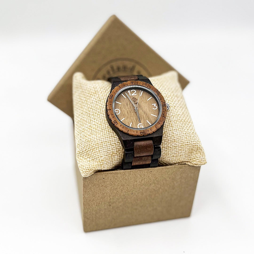 Wooderland Venus wooden watch with bamboo and walnut wood finish displayed in a gift box on a burlap cushion