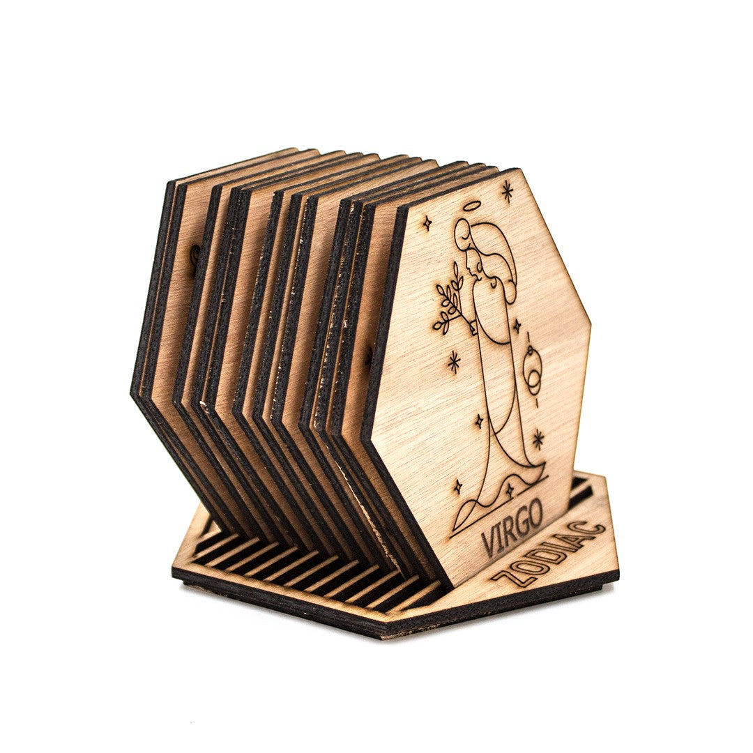 Wooderland hexagonal wooden Virgo zodiac coaster with intricate laser-cut design on a matching display stand