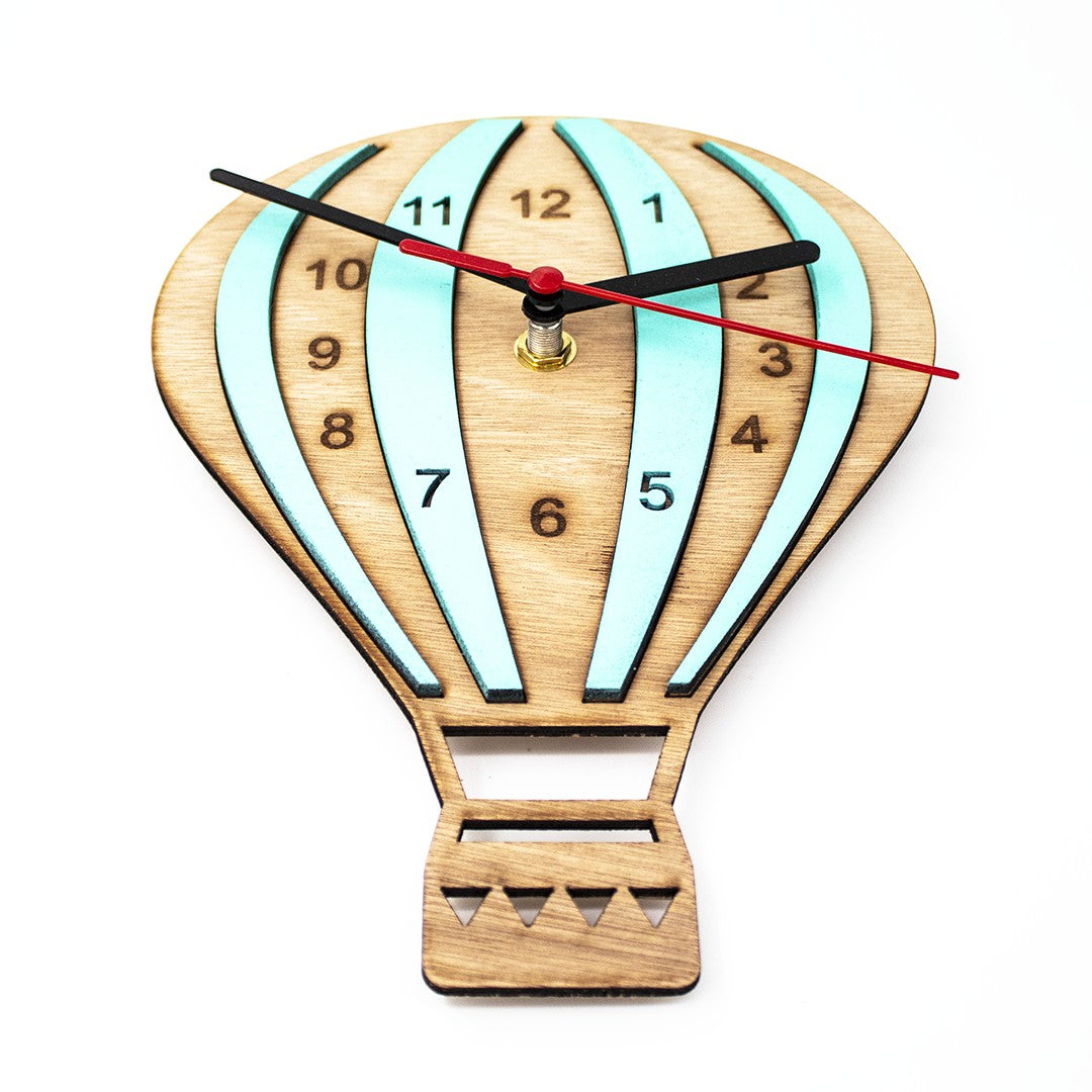 Wooderland wooden hot air balloon wall clock with light blue accents, black hands, and a red second hand.