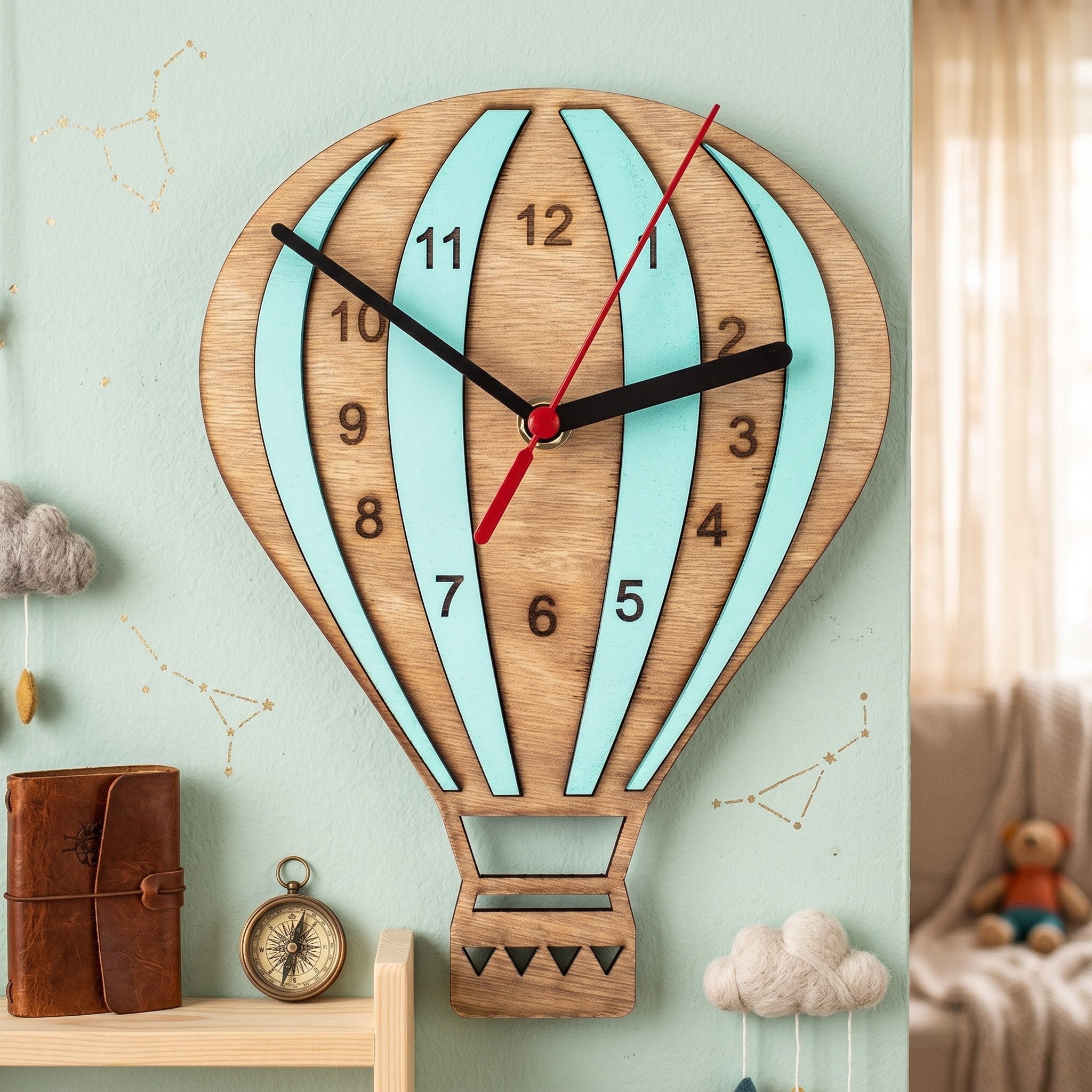 Wooderland wooden hot air balloon wall clock with mint green accents and silent quartz movement in a nursery.