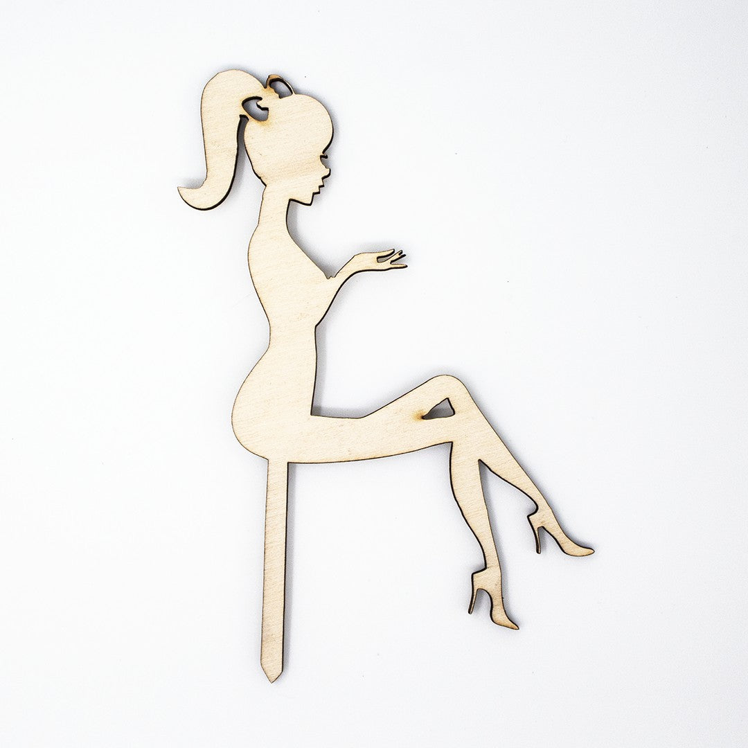 Wooderland laser-cut wooden bride silhouette cake topper in natural plywood finish for weddings or bridal showers.