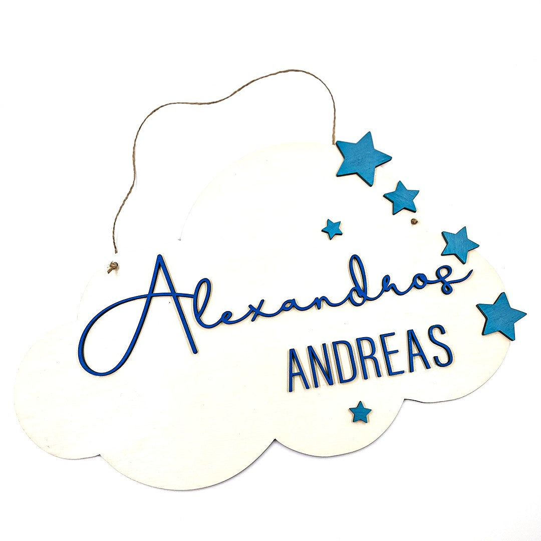 Wooderland custom wooden cloud bedroom door sign with blue 3D lettering and star accents on a white background