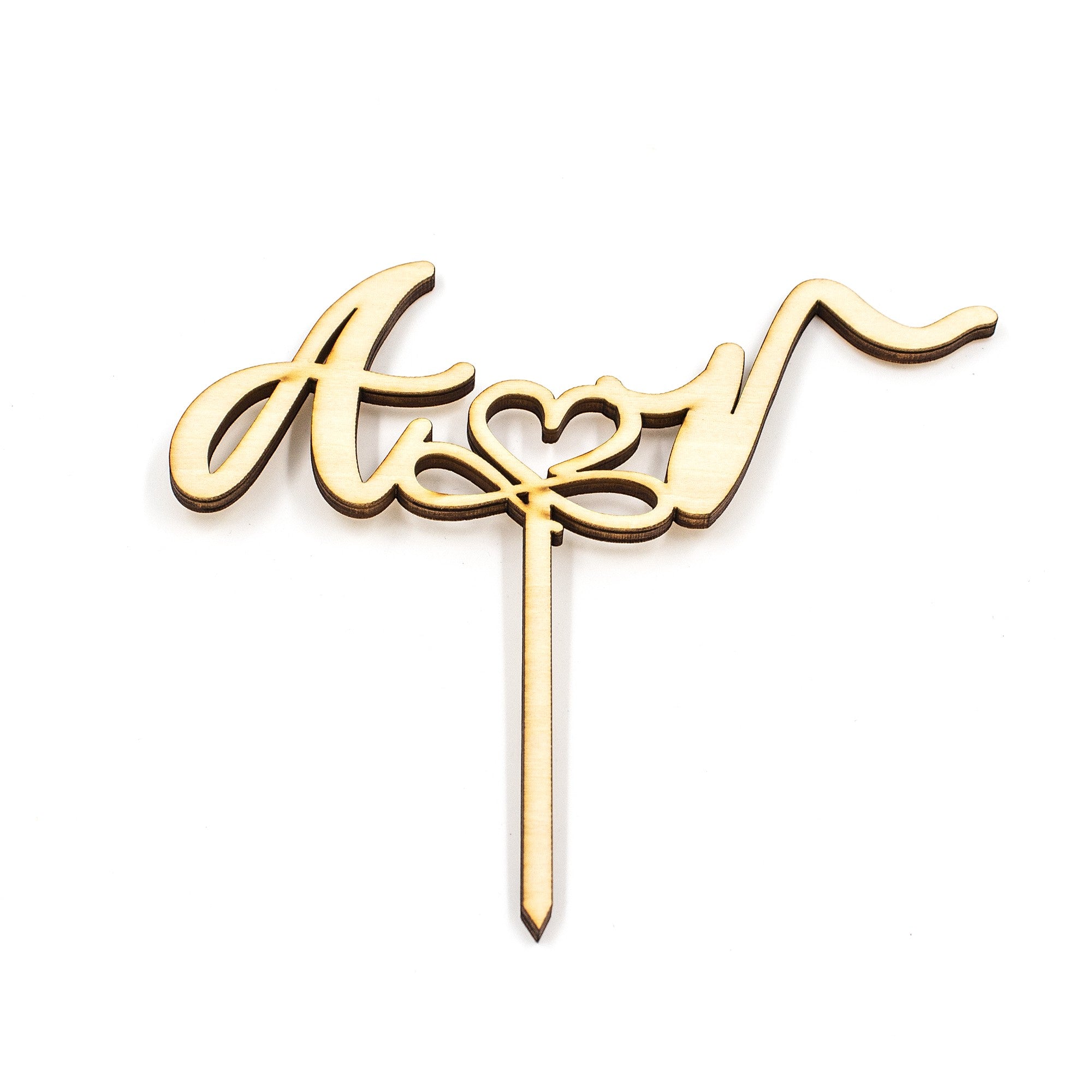 Wooderland wooden cake topper featuring elegant cursive initials connected by a heart for a wedding cake decoration.