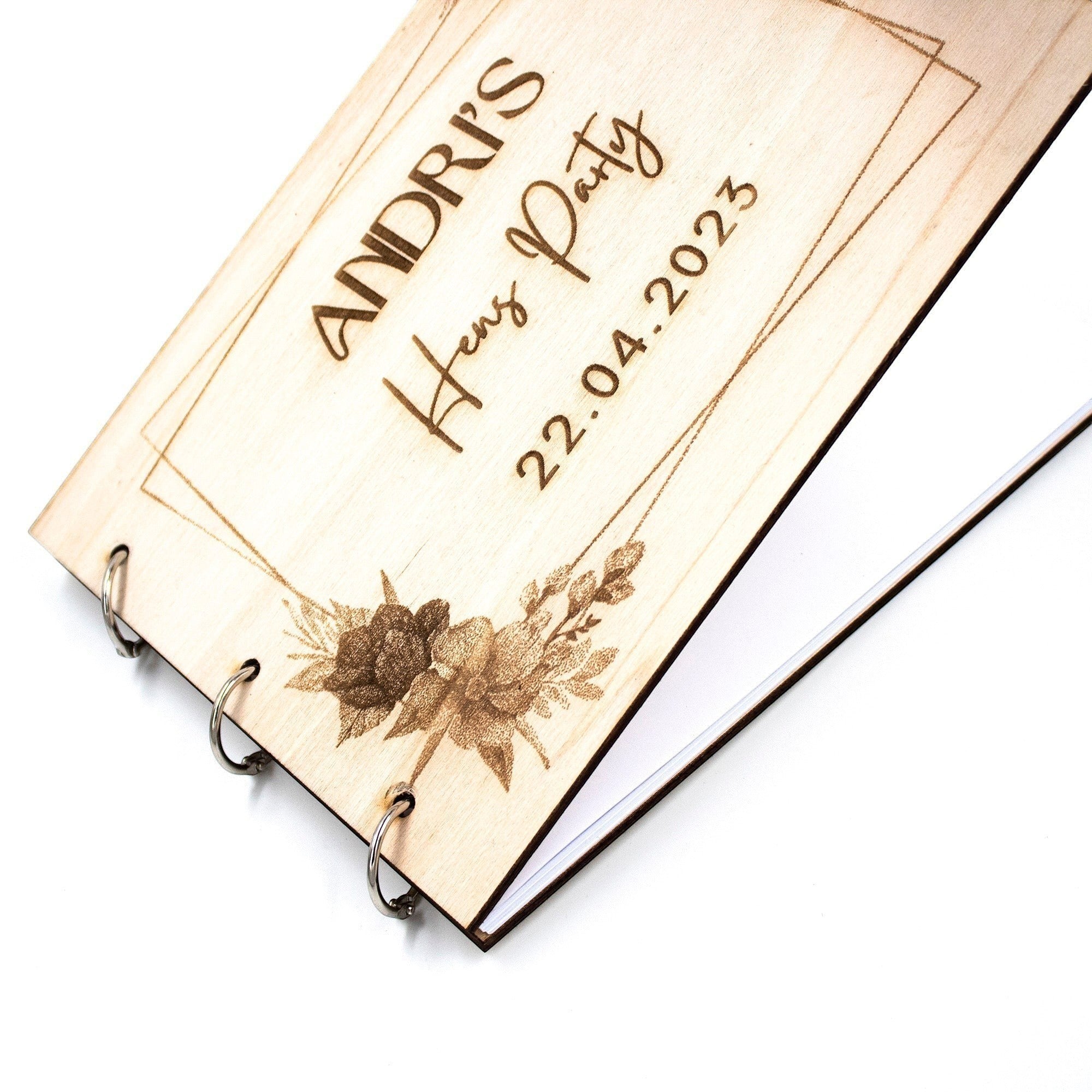 Wooderland A5 wooden wish book with engraved floral design and custom text for a hen party on a white background.