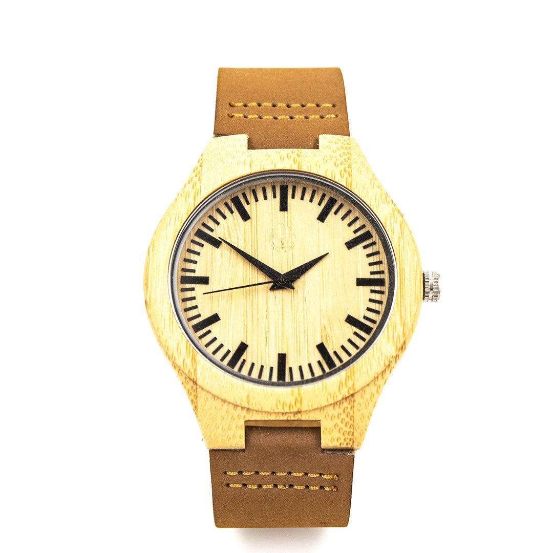 Wooderland Zeus natural wood watch with a light wood dial and brown leather strap on a white background.
