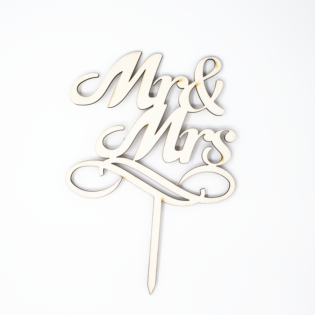 "Mr & Mrs" wooden cake topper made of high-quality wood, adds an elegant and romantic touch to wedding cakes. Perfect for personalized and unique wedding cakes, and also as a keepsake to remember the special day.