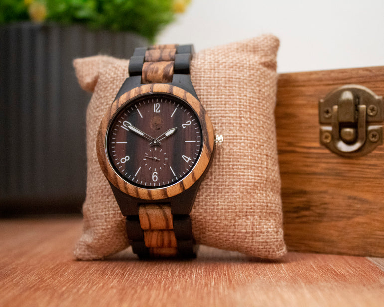 Elevate your style with the Cerberus wooden watch - an eco-friendly timepiece made with real wood, featuring a comfortable fit and a brushed silver buckle. The natural wood design adds a unique touch to your everyday wear, and each watch comes in a beautiful box, making it the perfect gift or addition to your collection. Shop now!