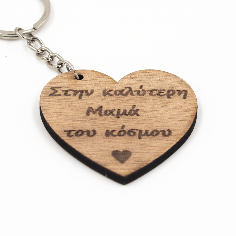 Wooden keyring with 'Best Mom in The World' message, perfect gift for Mother's Day or any occasion. Intricate detailing and made from high-quality materials.