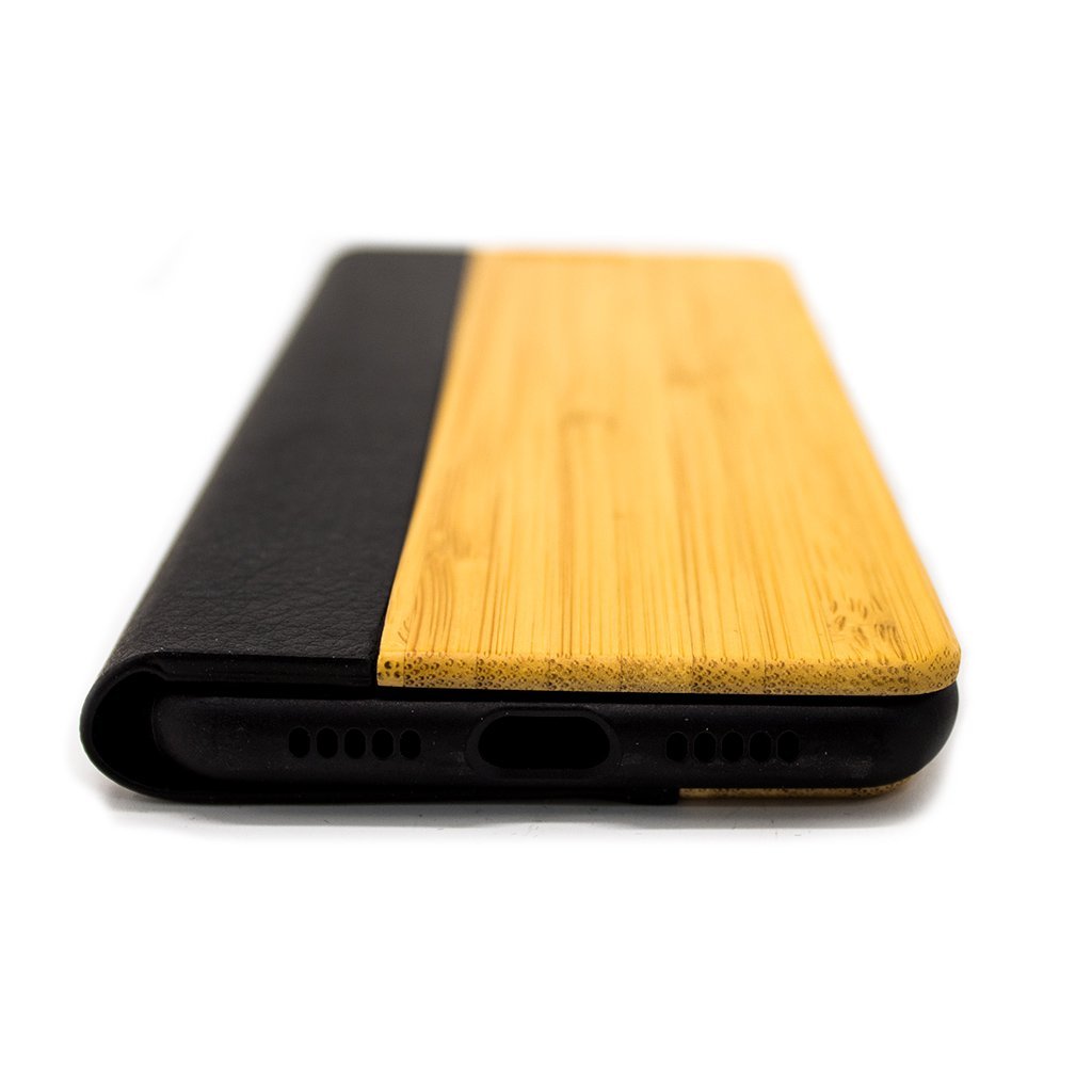 Protect your Huawei P20 Wooden Flip Case with our premium wooden phone case. Our cases are made from real wood and high-quality materials, providing first-class protection and a natural feel. The unique wood grain and color of each case makes it truly one-of-a-kind. The polycarbonate bumper provides maximum impact resistance, while the ultra-thin and lightweight design ensures a sleek and stylish look. With built-in buttons for volume and snap-on application, it's easy to install and use.