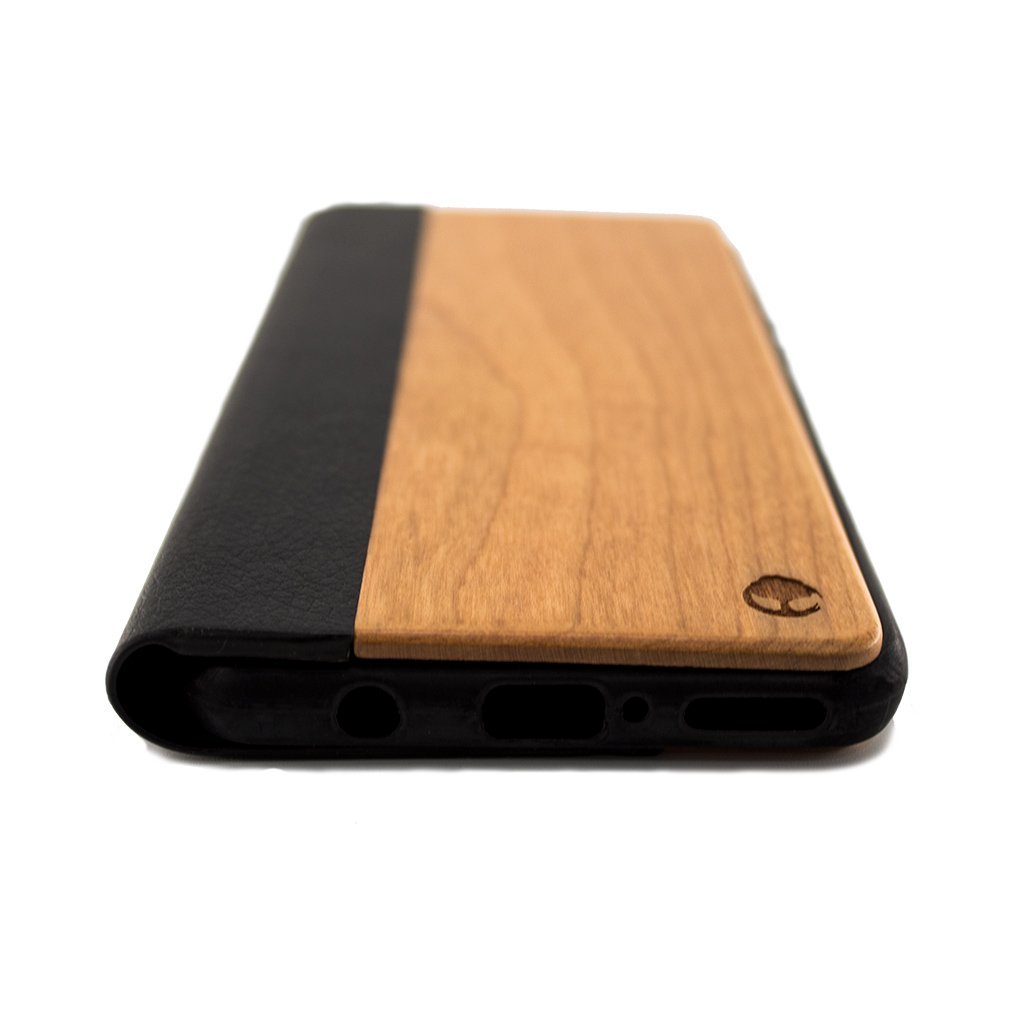 Protect your Huawei P30 Lite Wooden Flip Case with our premium wooden phone case. Our cases are made from real wood and high-quality materials, providing first-class protection and a natural feel. The unique wood grain and color of each case makes it truly one-of-a-kind. The polycarbonate bumper provides maximum impact resistance, while the ultra-thin and lightweight design ensures a sleek and stylish look. With built-in buttons for volume and snap-on application, it's easy to install and use.