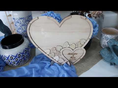 Custom Wooden Wish Heart box with small hearts inside, perfect for special occasions such as weddings and anniversaries. The heart is covered in a sturdy acrylic finish and can be personalized with the couple's name and date. Use the small hearts to express your love and appreciation and create lasting memories with your loved ones. This unique and thoughtful gift is sure to be treasured for years to come.