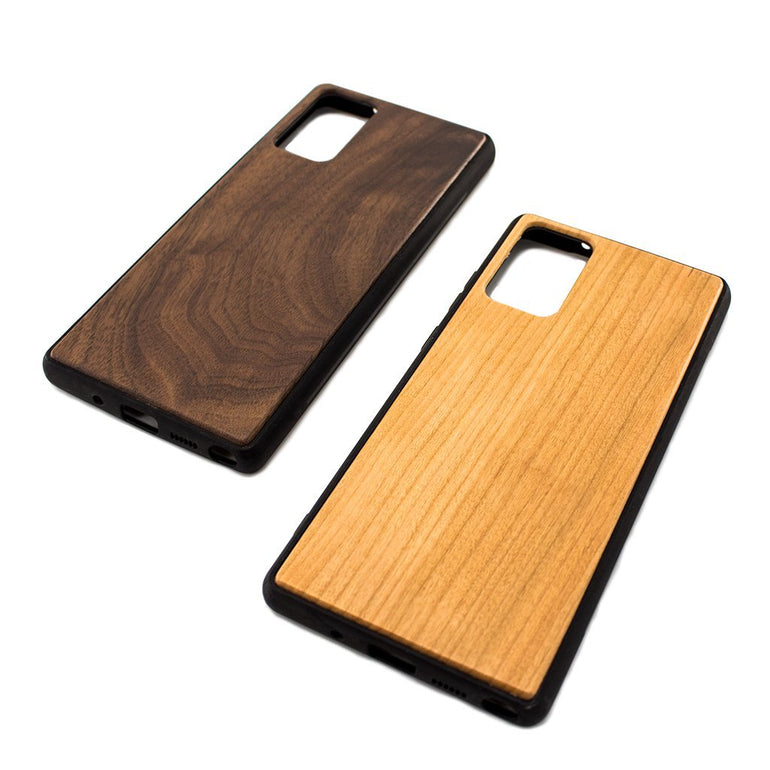 Protect your Samsung Note 20 Serie with our premium wooden phone case. Our cases are made from real wood and high-quality materials, providing first-class protection and a natural feel. The unique wood grain and color of each case makes it truly one-of-a-kind. The polycarbonate bumper provides maximum impact resistance, while the ultra-thin and lightweight design ensures a sleek and stylish look. With built-in buttons for volume and snap-on application.