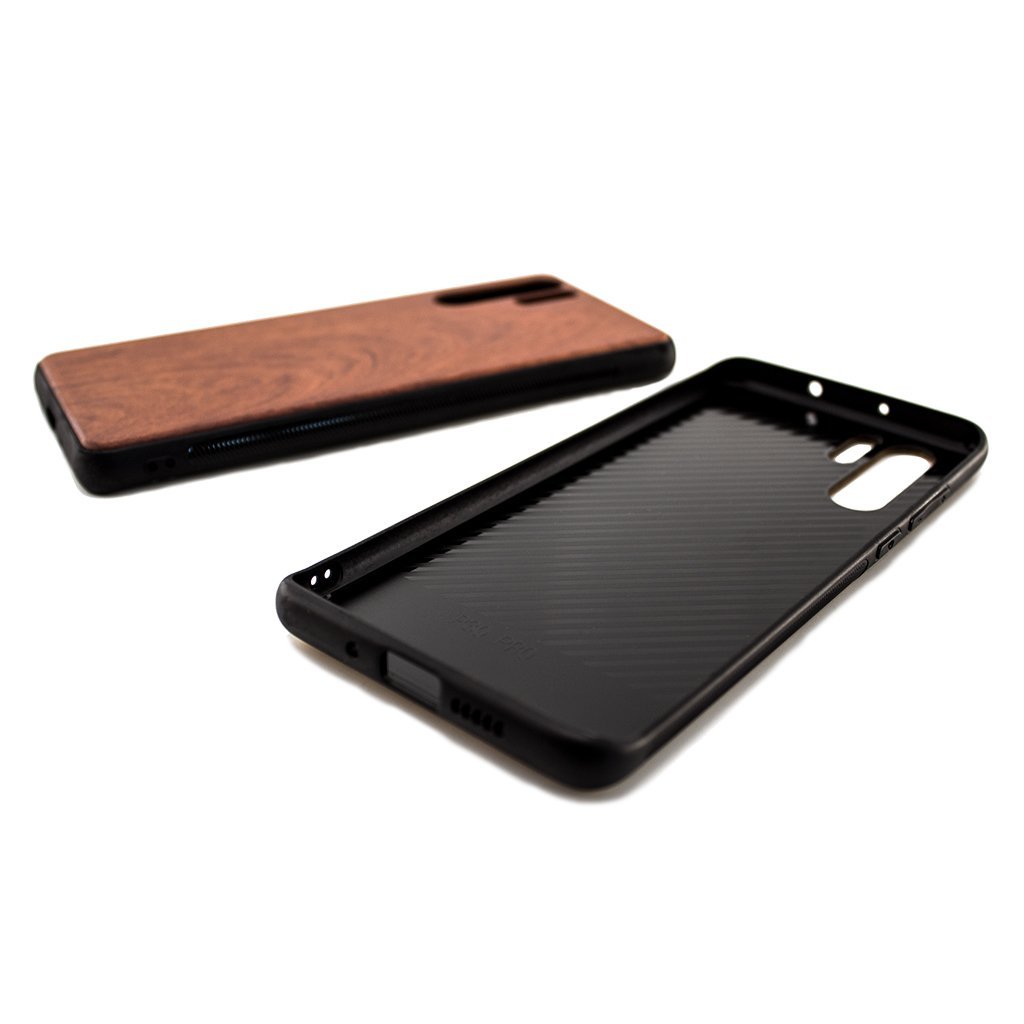 Protect your Huawei P30 Pro Case with our premium wooden phone case. Our cases are made from real wood and high-quality materials, providing first-class protection and a natural feel. The unique wood grain and color of each case makes it truly one-of-a-kind. The polycarbonate bumper provides maximum impact resistance, while the ultra-thin and lightweight design ensures a sleek and stylish look. With built-in buttons for volume and snap-on application, it's easy to install and use.